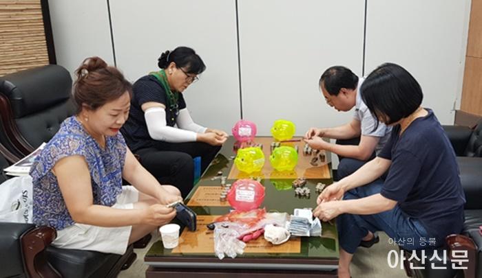7.온양3동 저금통 후원.jpg