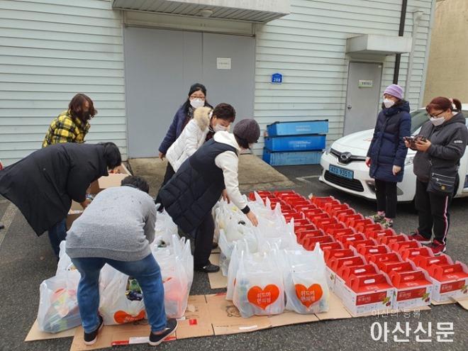 9. 온양5동 여성자원봉사단, 1월 식생활용품 나눔 행사.jpg